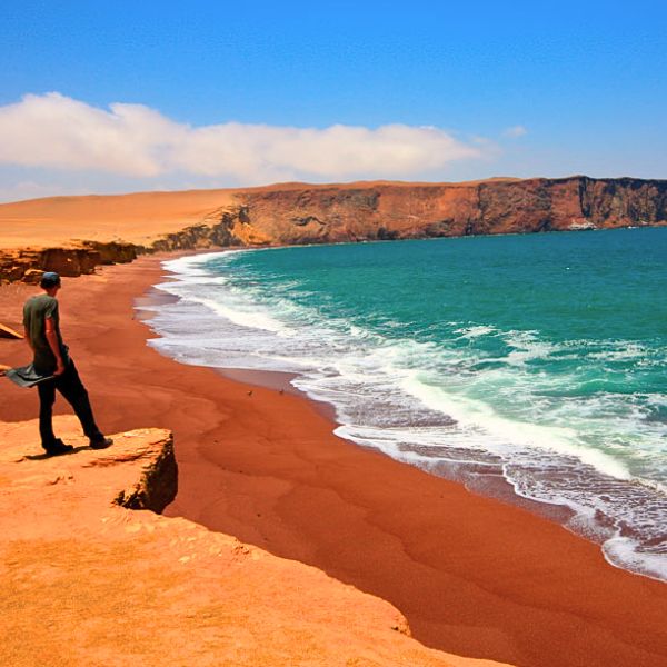 Visiting the read beach at the Paracas Peninsula.