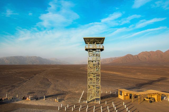Aerial view of the Nazca Lines observation tower in the desert of southern Peru.