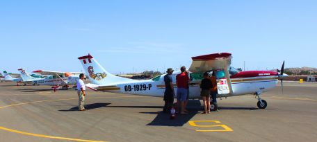 Flying over the ancient Nazca and Palpa geoglyphs in a small plane.