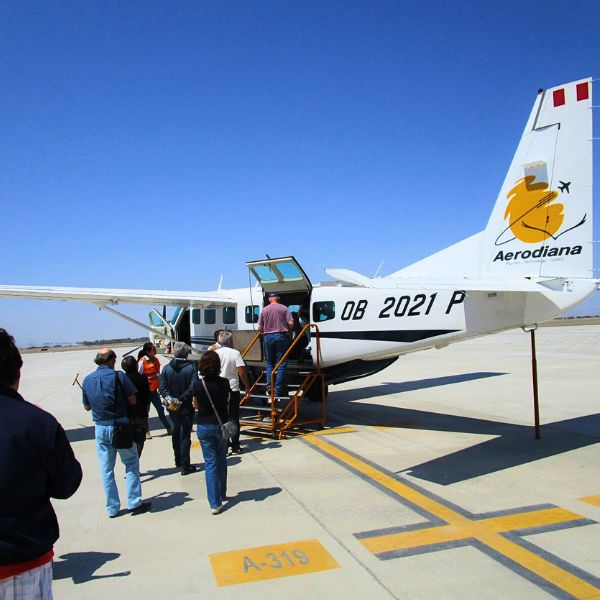 Cessna Grand Caravan at Pisco Airport ready to take off over the Nazca Lines desert.