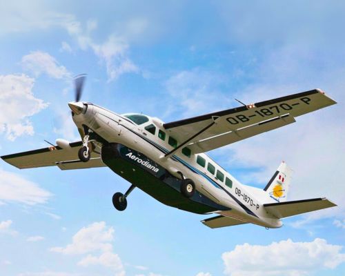 Cessna Grand Caravan flying over the Peruvian desert