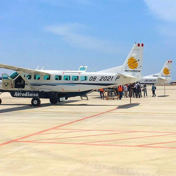 Aerodiana aircraft at the runway of Pisco Airport preparing for Nazca Lines flight