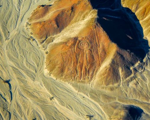 Astronaut geoglyph in the Nazca desert viewed from the air