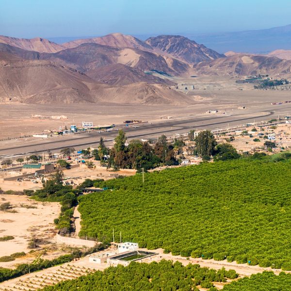 Aerial view of Nazca Airport and surrounding desert landscape.