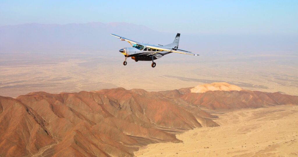 Aerial view of the Nazca Lines desert during scenic flight from Pisco Airport