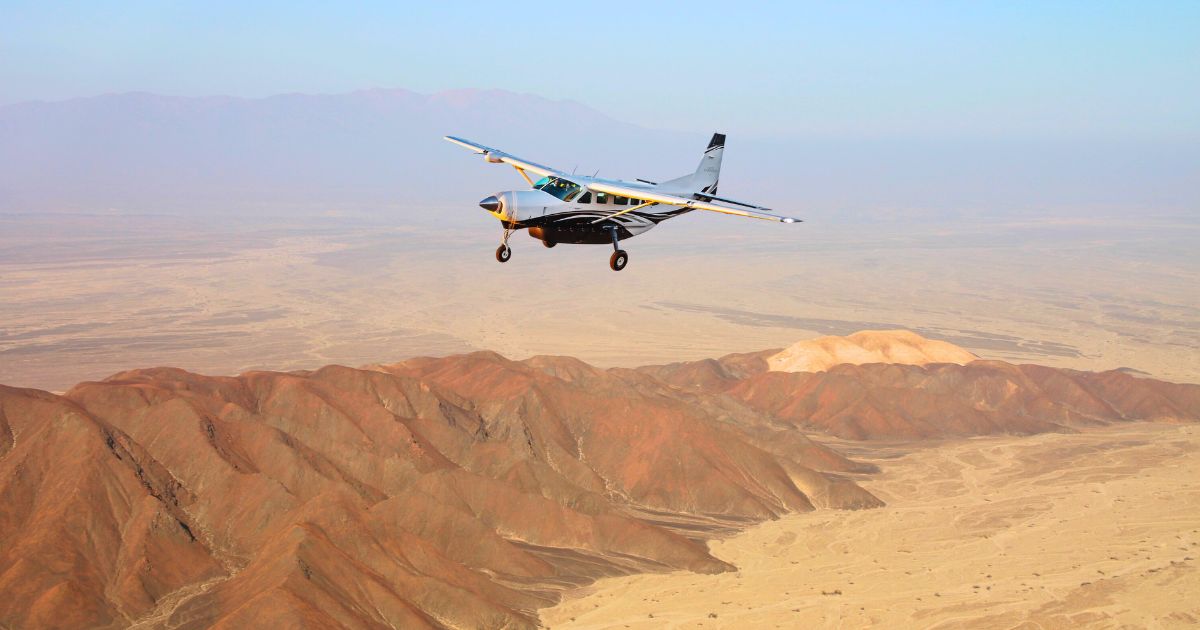 Aerial view of the Nazca Lines desert during scenic flight from Pisco Airport