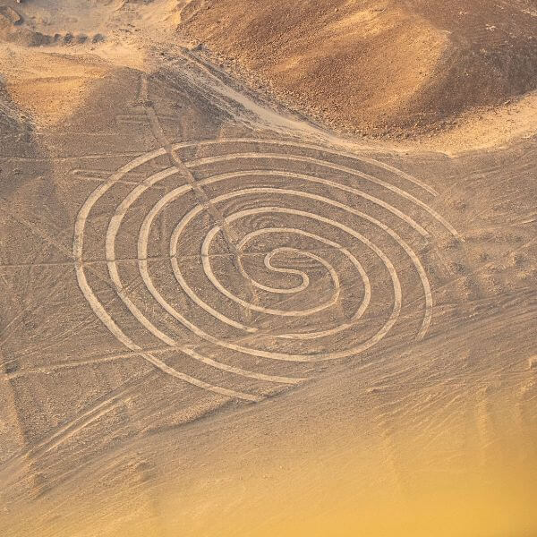 Spiral geoglyph formation seen during a Nazca Lines Private Flight over the desert