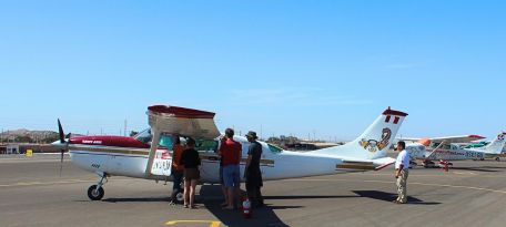 Tourists boarding a small Cessna aircraft at Nazca Airport for the Palpa Lines Flight