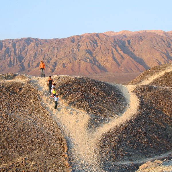 Exploring a natural Nazca lookout point to see lines on the desert