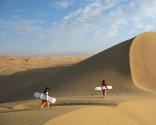 Usaka towering dunes by sunset.