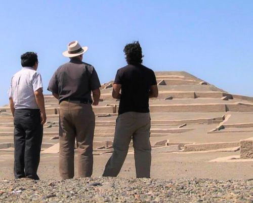 Visitors observing the Cahuachi pyramids.
