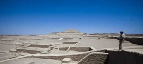 Panoramic view of Cahuachi pyramids under blue sky