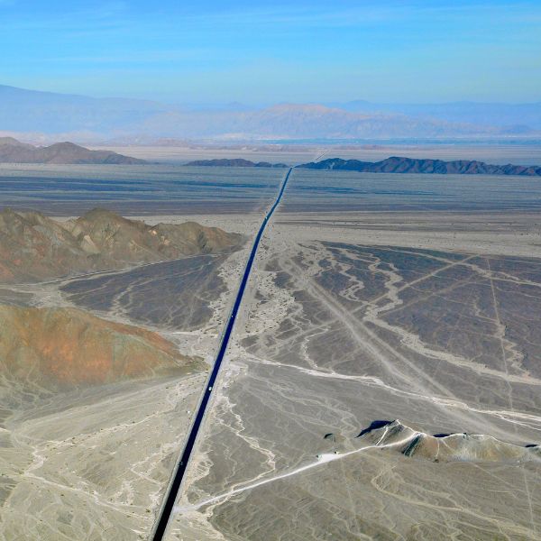 Aerial view of the Pan-American Highway cutting through the Nazca desert