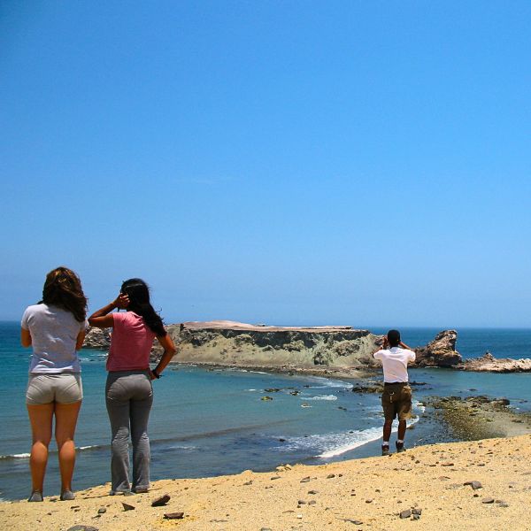Tourists admiring the cliffs of San Fernando Marine Reserve